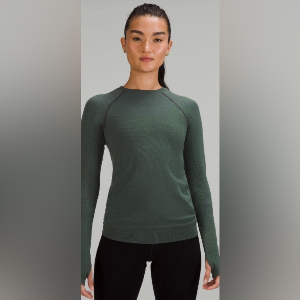 Lululemon Keep  The Heat, thermal and smoked  spruce color. Size 4.